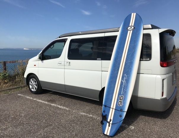 campervan and surfboard
