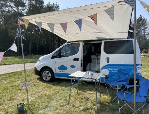 electric camper with bunting